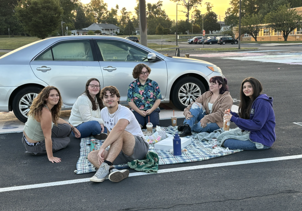 My friends and I watching the anti-climactic senior sunrise